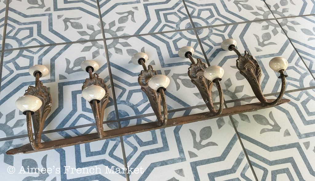 Antique French Cast Iron Wall Coat Rack | Belle Époque Porcelain Tipped Hooks | Acanthus Shell Motif