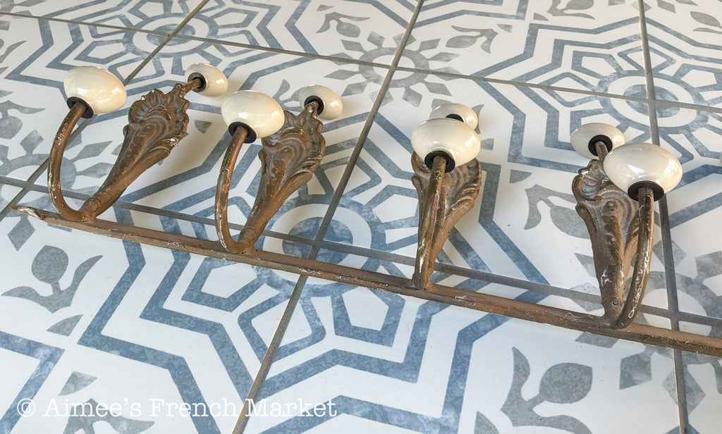 Antique French Cast Iron Wall Coat Rack | Belle Époque Porcelain Tipped Hooks | Acanthus Shell Motif